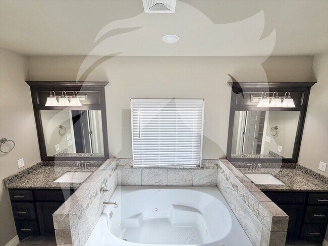 Building Photo - "Stunning 4-Bed Gem with Granite Touch & C...