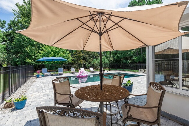 Building Photo - "Coastal Elegance Awaits: Spacious 4-Bed Oasis with $400.00 Off First Full Months Rent!"