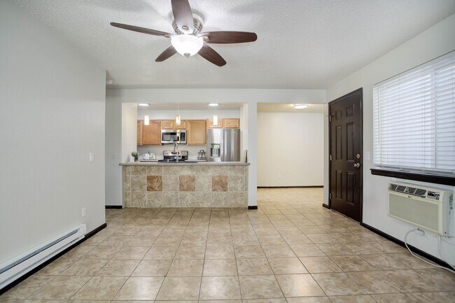 Building Photo - Penthouse level condo with views of canal and trail!
