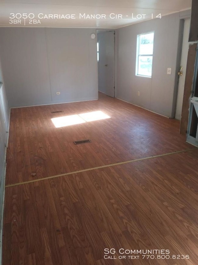 Building Photo - 3050 Carriage Manor Cir