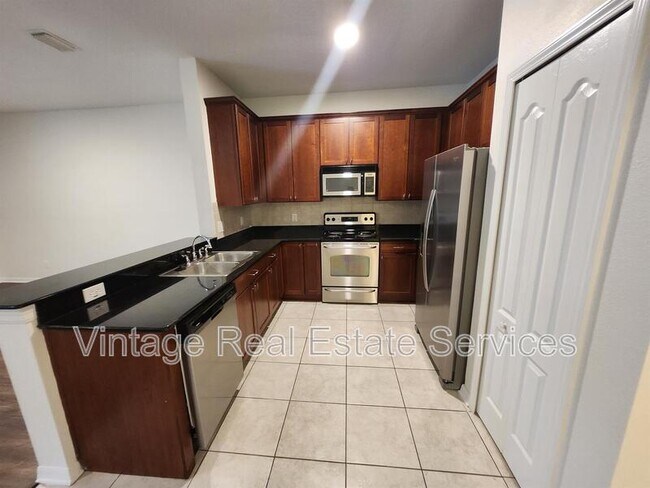 Building Photo - 9333 Stone River Pl