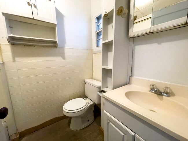 Building Photo - Fall into this cozy 3-Bedroom Home with a fenced in yard & detached garage!