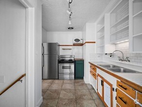 Building Photo - Spacious 4-Bedroom Home w/large Outdoor Sp...