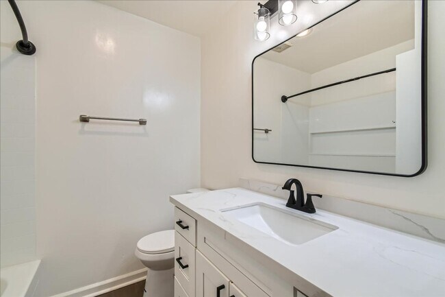 Building Photo - MOVE IN SPECIAL- Live in the Heart of Nort...