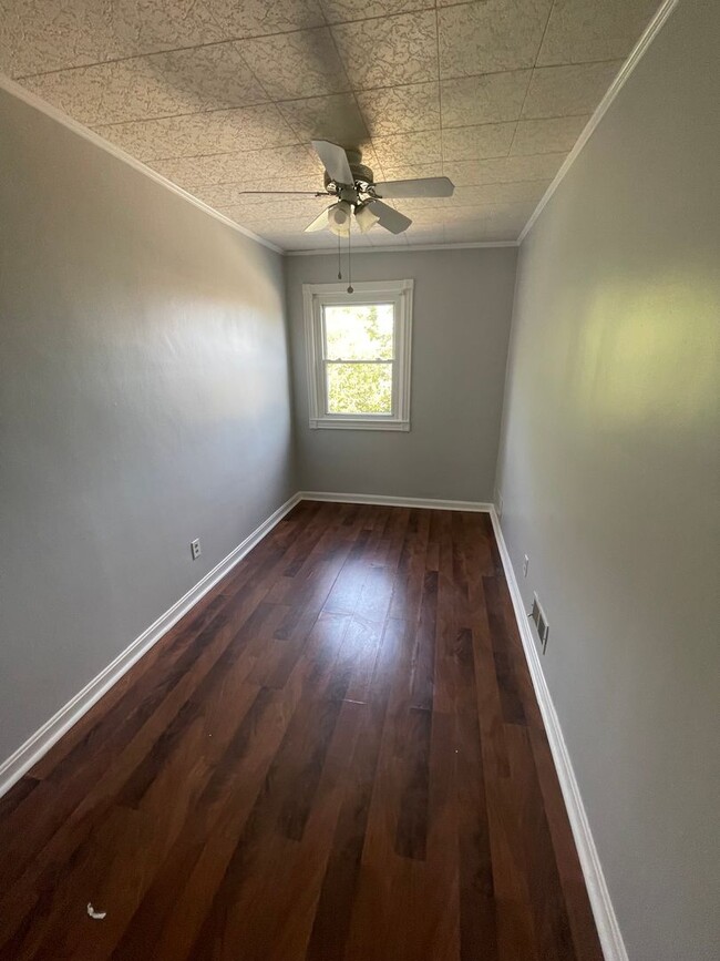 Building Photo - Freshly Painted 3 Bedroom House with Basem...