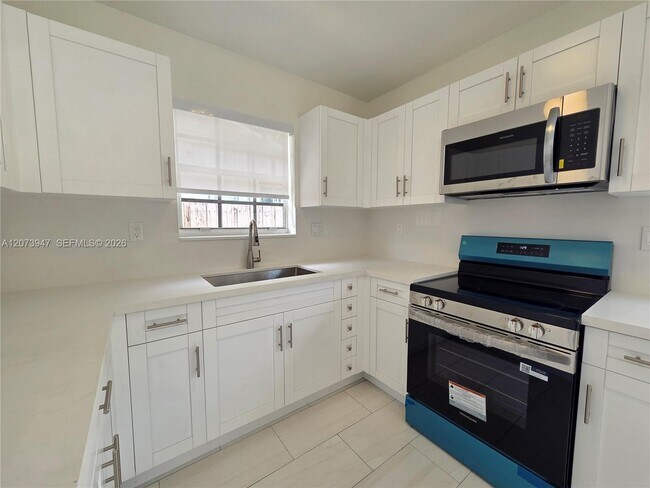 Building Photo - 242 NW 51st Ave