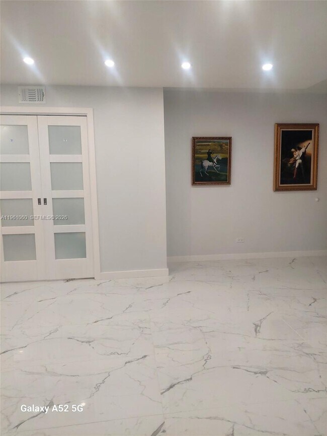 Building Photo - 5005 Collins Ave