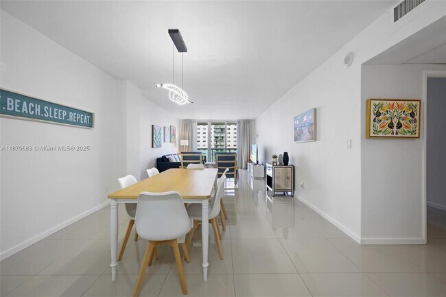 Building Photo - 19370 Collins Ave