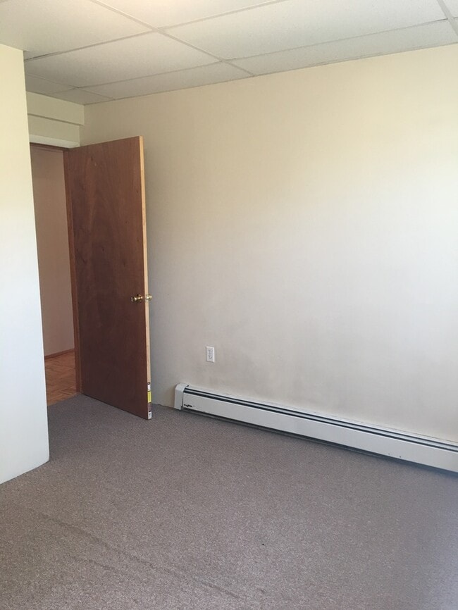 Building Photo - Beautiful secluded 4 bedroom 2.5 bath home with 2 stall detached garage and descent sized yard