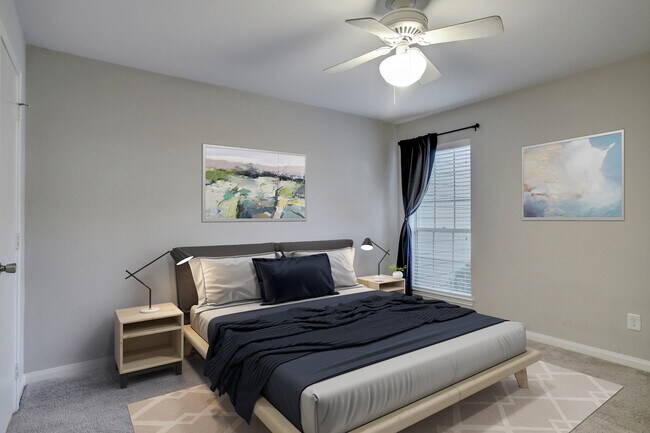 Comfortable bedroom with walk-in closet. - 1880 White Oak Dr. Apt 119