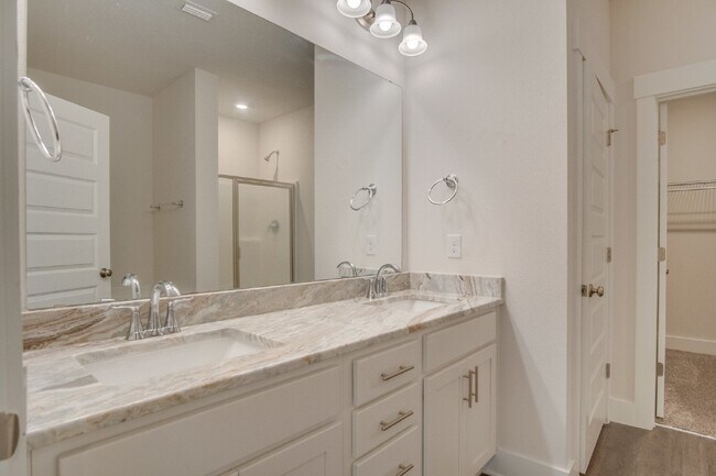 Building Photo - Spacious Cantonment Townhome with Open Layout, 2-Car Garage, Covered Back Porch & Easy Access to ...