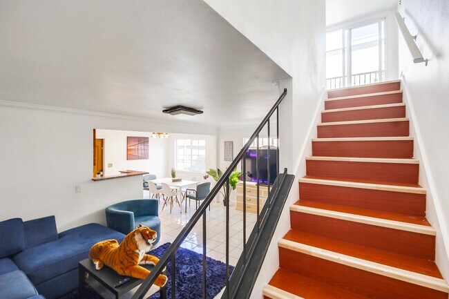 The home is split into 2 floors w/ room for the whole family. - 2304 E 14th St