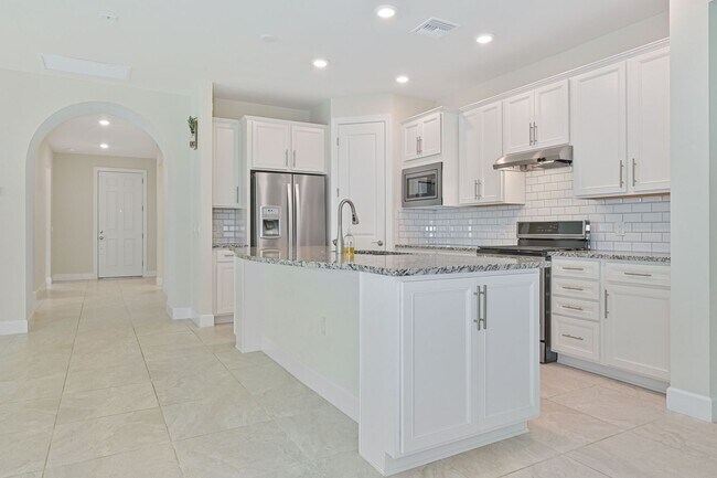Building Photo - NOW AVAILABLE - 2/2 Plus Den Single Family Home in the Heart of Estero!