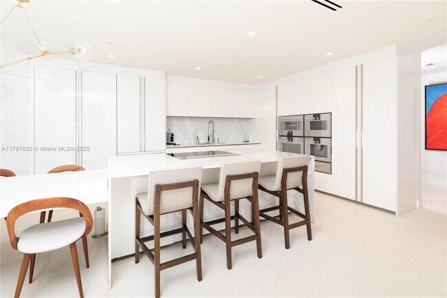 Building Photo - 10201 Collins Ave