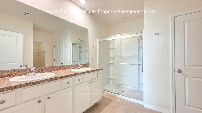 Building Photo - MOVE IN READY ! 4 BEDROOM/2 BATH! TILE- LVP THROUGHOUT! LAWN MOWING INCLUDED!