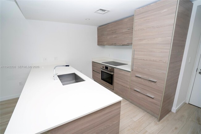 Building Photo - 1300 S Miami Ave