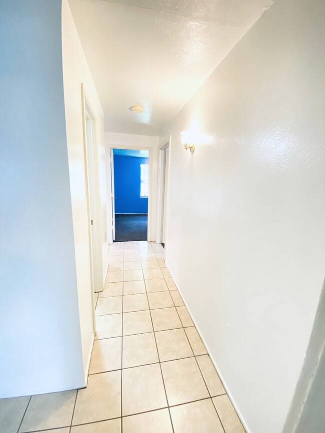 Hallway to Blue Bedroom - 4010 Heatherbrook Dr