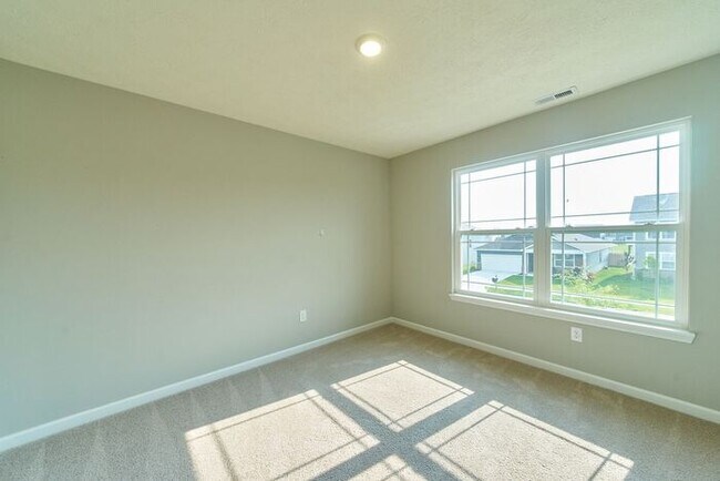 Building Photo - 4 Bedroom at Trotter's Landing in Camby With Pond View!
