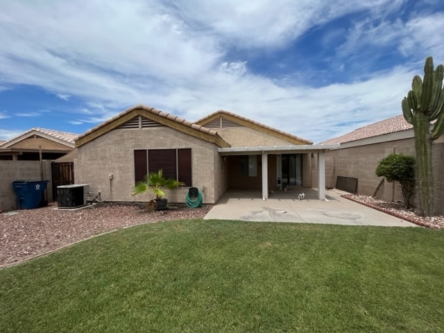 Green back yard with grass. - 1169 W 18th Ave