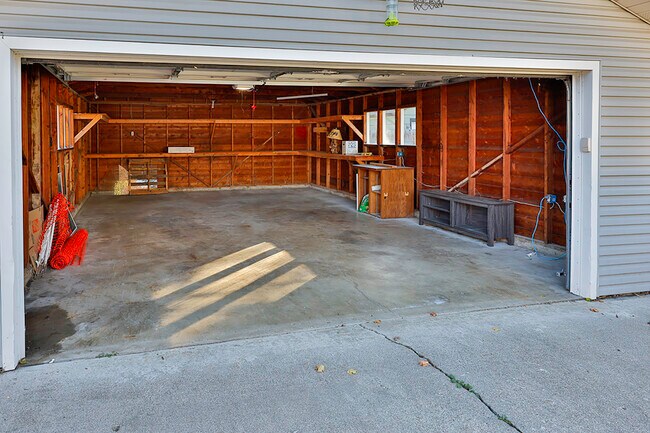 Large 2 car garage with storage shelves - 1020 E Garden Ave