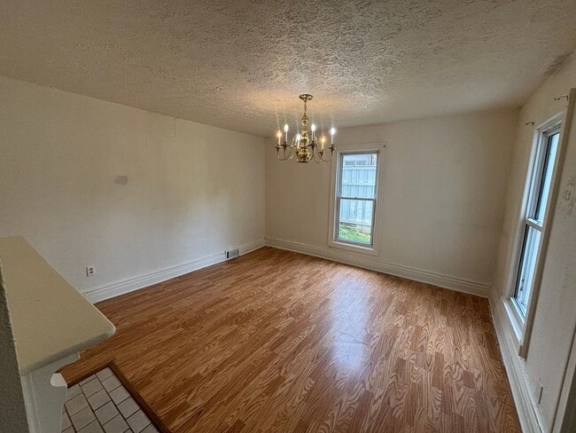 Building Photo - Use Your Tax Return For This Sweetheart of a Deal! Spacious rooms, updated mechanicals, and conve...