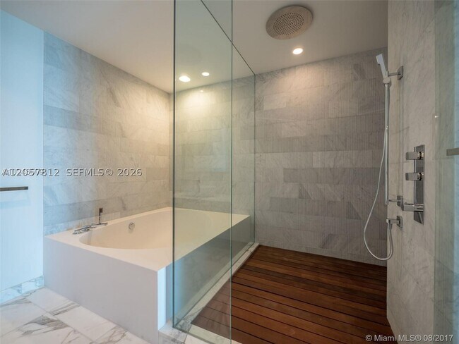 Building Photo - 10201 Collins Ave