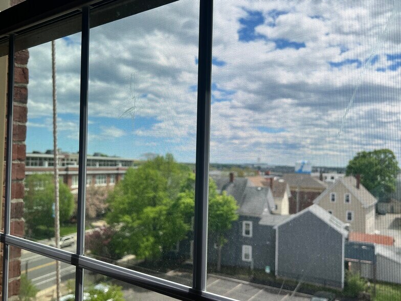 Living room view... a peak at the water - 50 Rantoul St