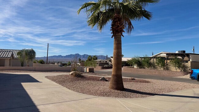 Building Photo - Sunsets, Views & Vibes - Your LHC Escape Awaits!