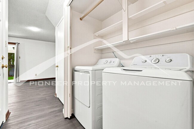 Building Photo - Spacious Home with Central AC and Traditional Wood Features