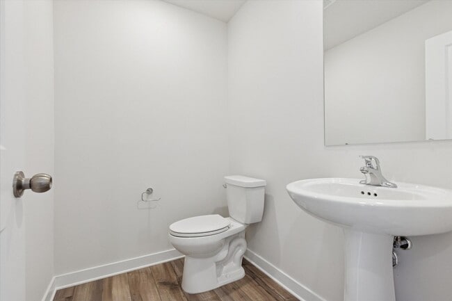 Building Photo - COMING SOON! Brand New River Pointe townhome with modern finishes, flexible living space, and a p...