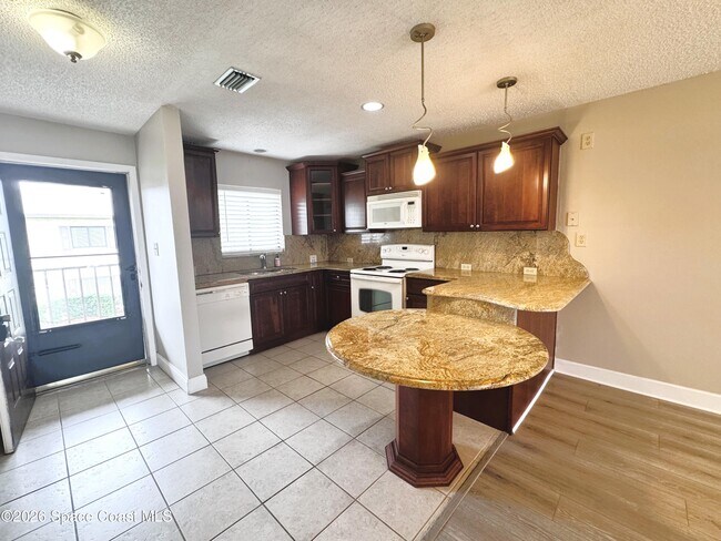 Building Photo - 325 S Banana River Blvd