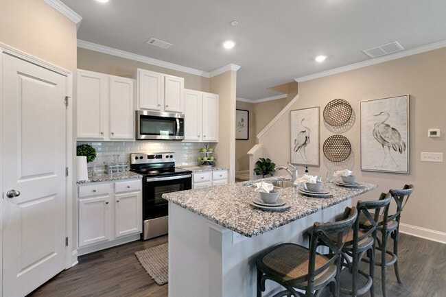 Open Kitchen with Island - Covey Homes Bluffs - Homes for Rent