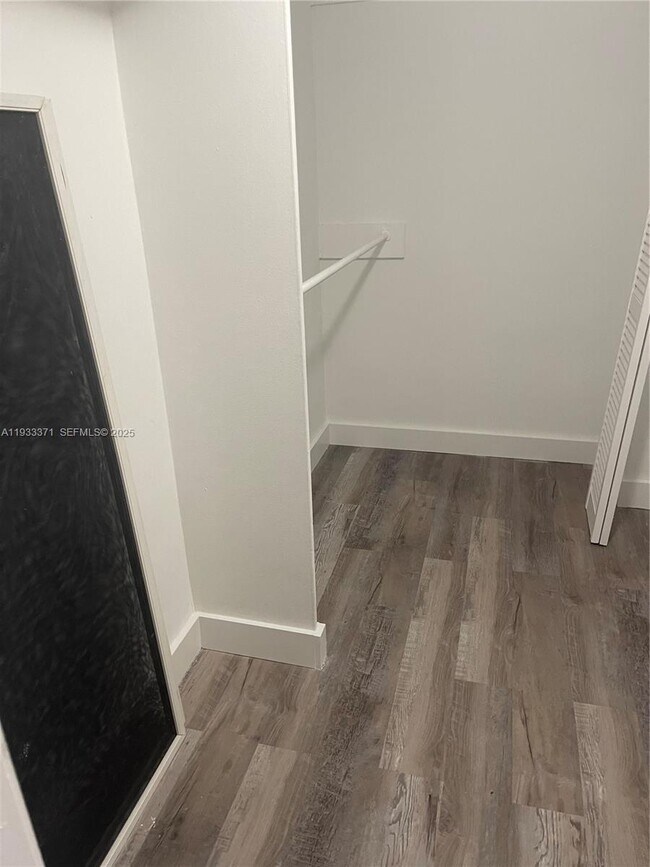 Building Photo - 5005 Collins Ave