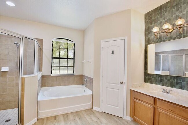 Building Photo - Water-View 4BR/3BA with 3-Car Garage in Gated North Shore - Near Lake Nona & Medical City