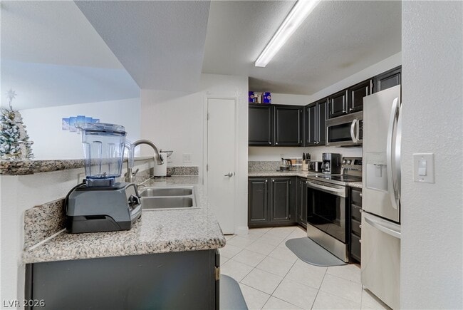 Building Photo - 5055 W Hacienda Ave