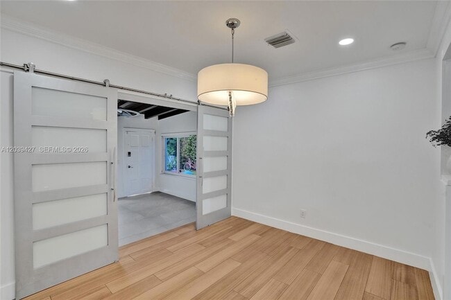 Building Photo - 213 NE 43rd St