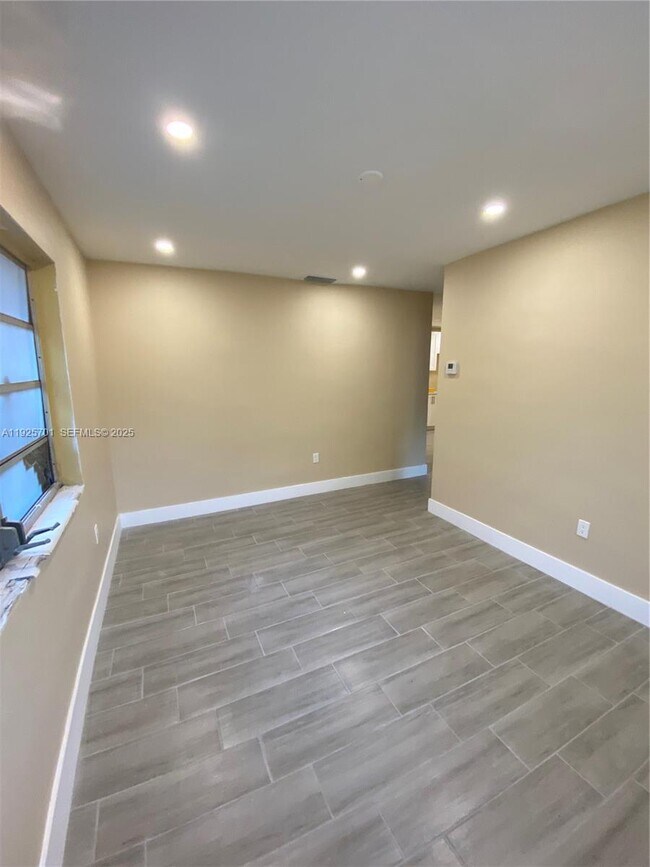 Building Photo - 234 NE 55th Terrace