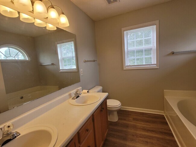 Building Photo - LVP floors, Large Yard!  3 BRM, 2 BHs, Double Garage!