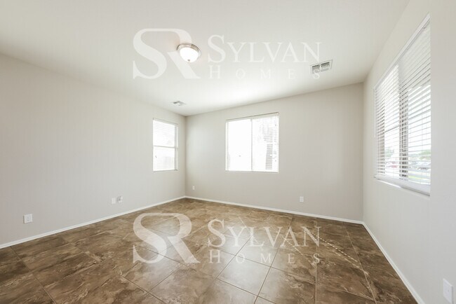 Building Photo - This home exudes a cheerful and welcoming charm!