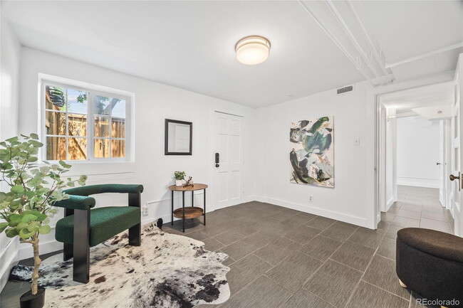 Building Photo - "Spacious 5-Bedroom Gem with Hardwood Floors & Cozy Fireplace in Denver's Heart!"