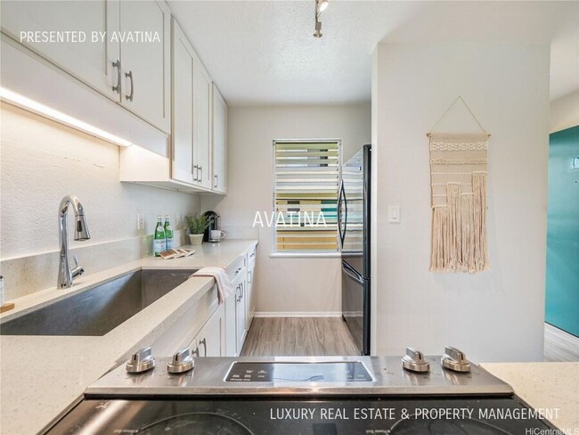 Building Photo - 46-232 Kahuhipa St Unit-E205