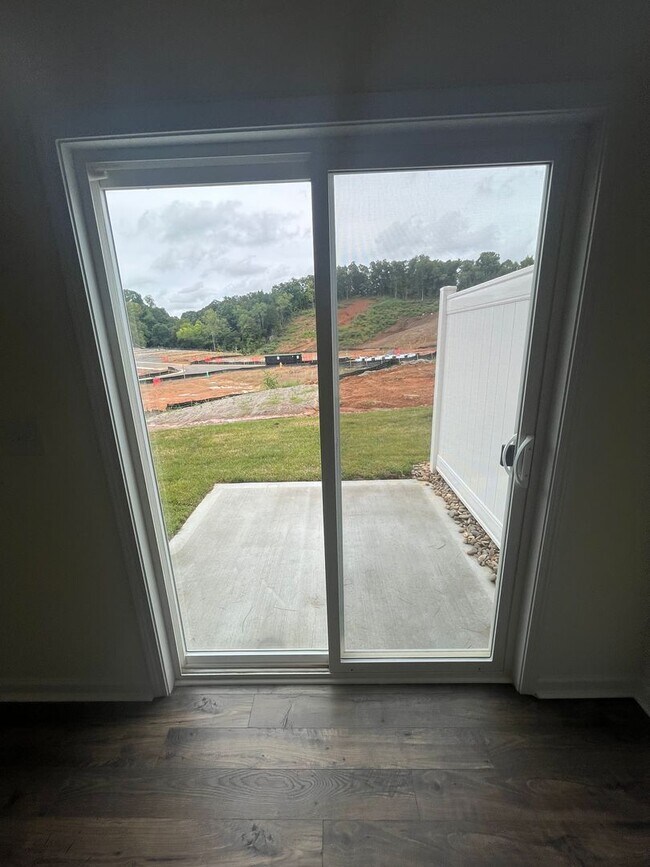 Building Photo - Brand New Townhome – Modern Comfort & Conv...