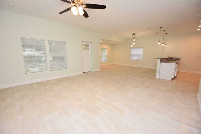 Building Photo - Newly Built 3/2  custom home  with den  Di...