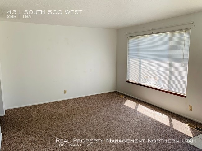 Building Photo - 2 Bedroom 1 Bath Brigham Duplex.