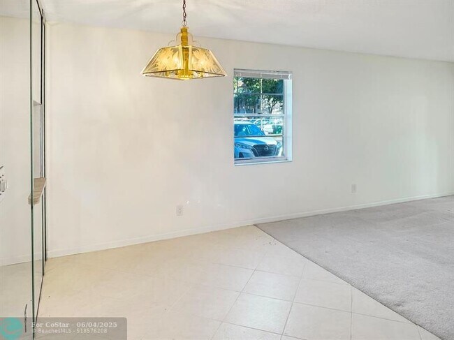 Building Photo - 6090 N Sabal Palm Blvd