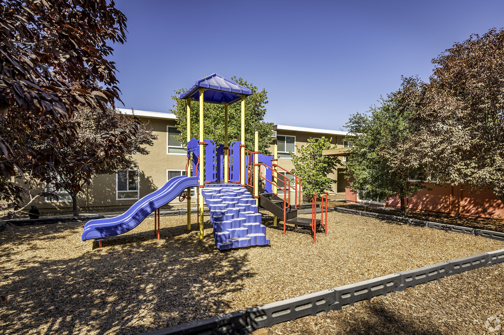 Playground, tot lot @ 8740 - River's Edge Apartments