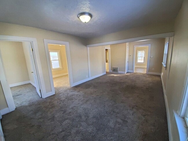 Building Photo - Rental home with deck, garage, and great backyard!