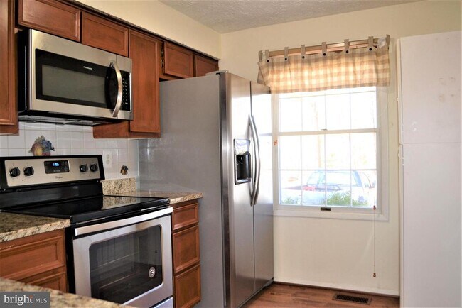 Building Photo - 8349 Windfall Rd