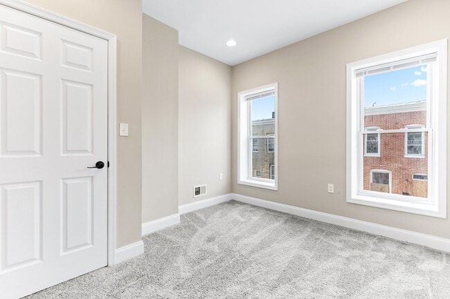 Building Photo - Parkside Haven: Contemporary 2-Bedroom Row Home Near Patterson Park