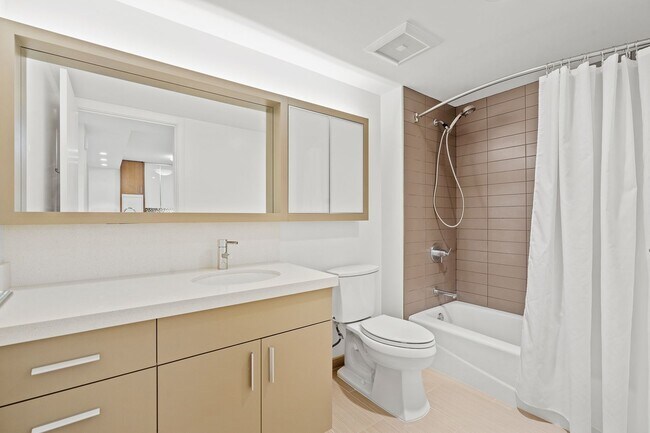 Building Photo - Stylish 1-Bedroom Unit at THE COLLECTION w...